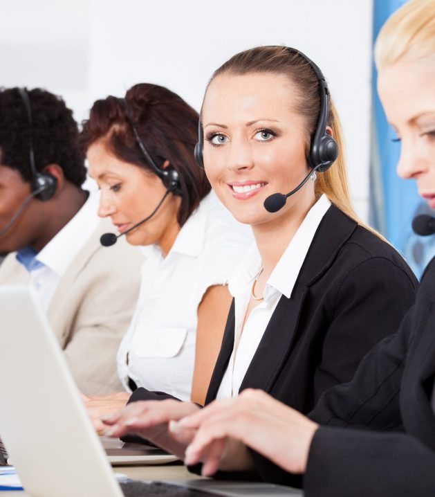 Happy,Co-workers,Wearing,Headsets,Working,In,Call,Center